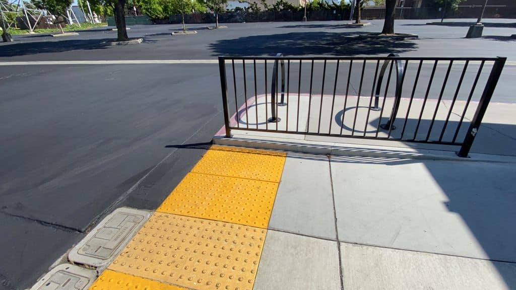 ADA Compliance: Ramps, Handrails & Premium Sealcoating