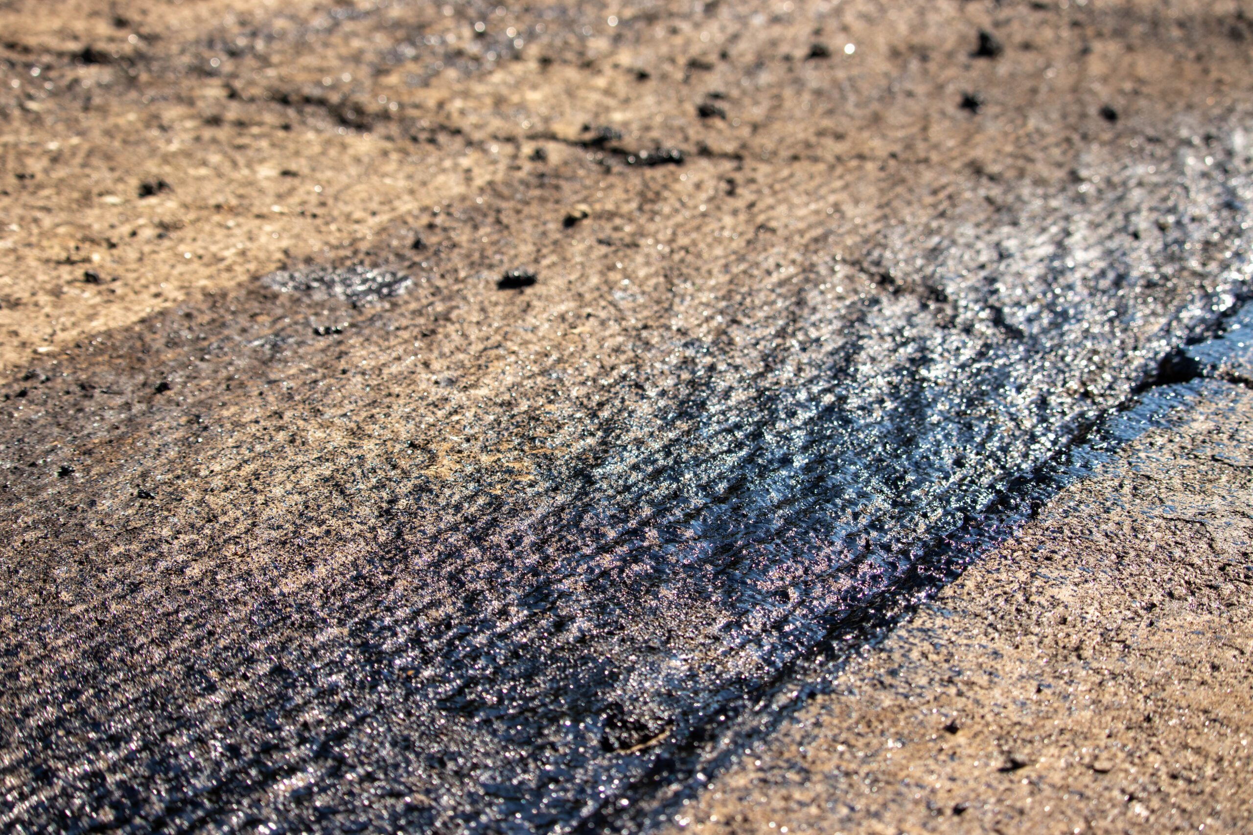 Can You Put Asphalt Over Concrete? Exploring Your Options
