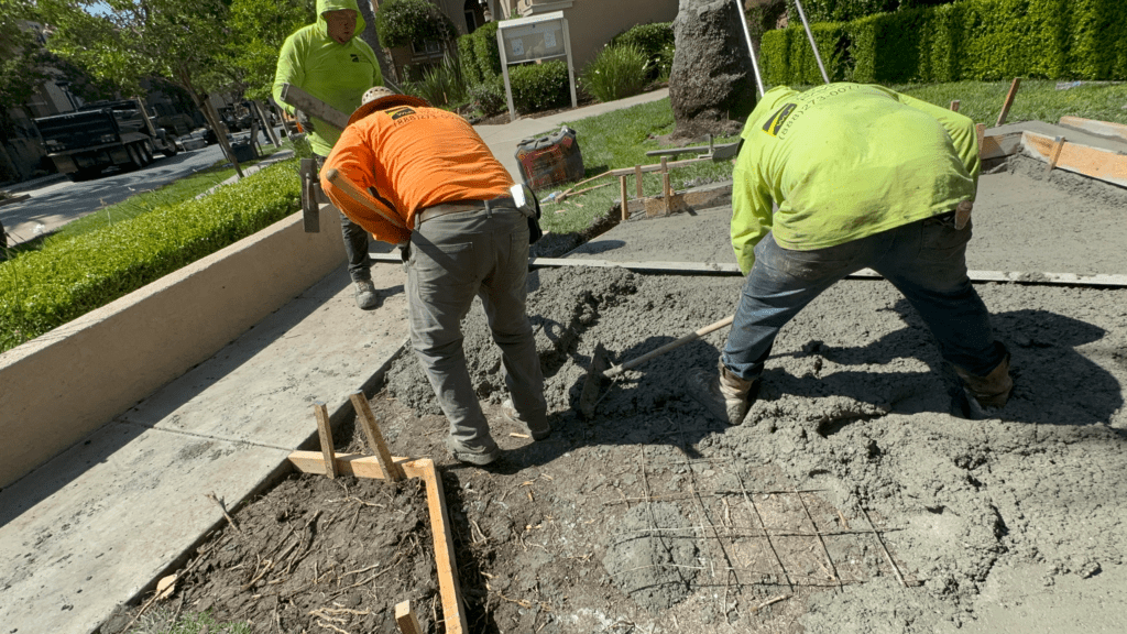 Concrete Contractors 1 concrete with shovels