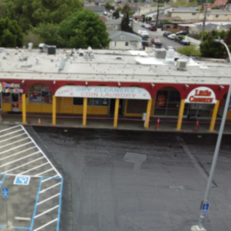 ADA Compliant Checklist: Parking Lot Conditions That Deserve a Closer Look 1 Coin laundry storefront with parking lot