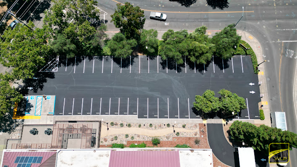 Patterson 1 Freshly sealed parking lot from above