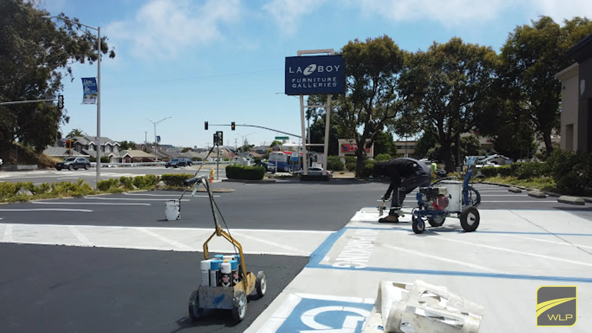 Parking-Lot-Striping-i8 Parking lot striping in progress.