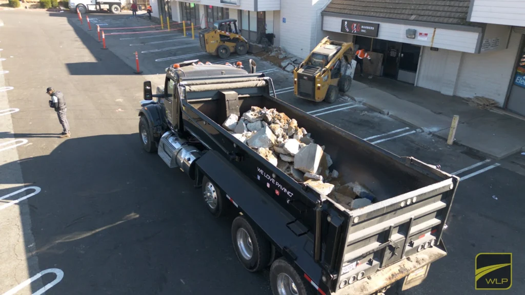 Heavy Trucks on new Asphalt 2 Dump truck unloading construction debris Project by We Love Paving in Northern California, CA.
