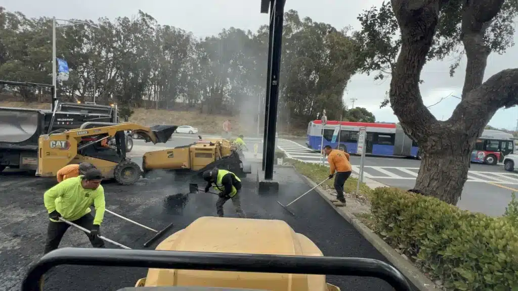 Sealcoating 2 Freshly sealcoated black asphalt parking lot with new white striping in South San Francisco. Project by We Love Paving in Northern California, CA.