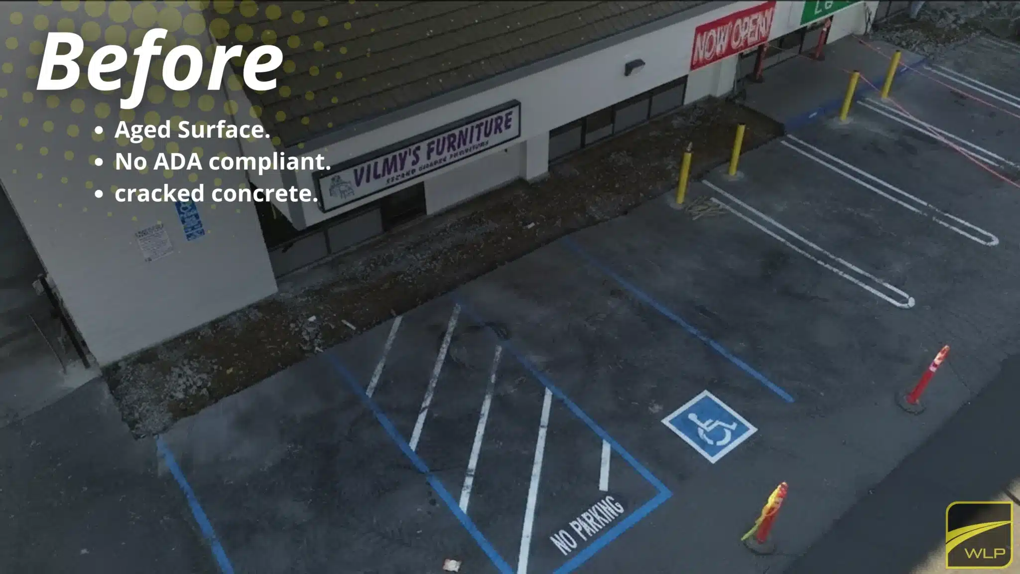 Cracked concrete and aged parking surface at Vilmy's Furniture before ADA compliance upgrades.
