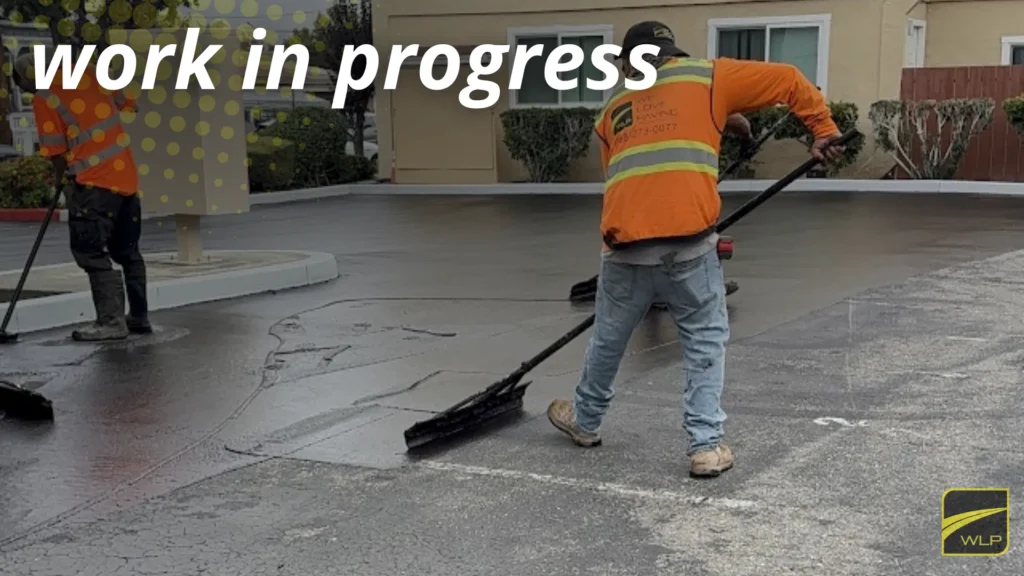 Asphalt Driveway Maintenance: 7 Proven Tips to Extend Its Lifespan 2 Worker performing asphalt driveway maintenance by filling cracks before sealing