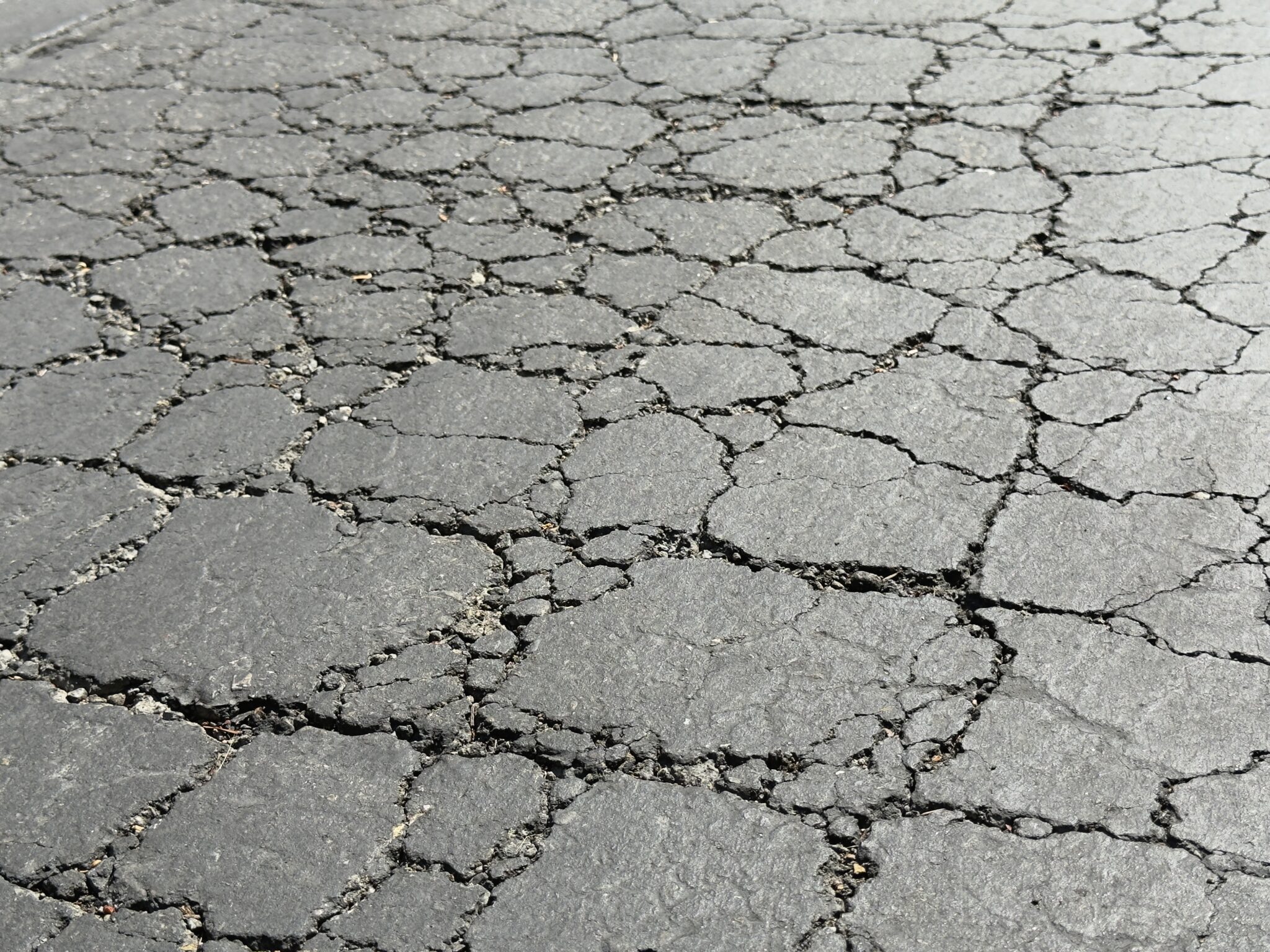Asphalt Raveling in California: Causes, Repair, and Prevention 1 asphalt-cracks-suunyvale