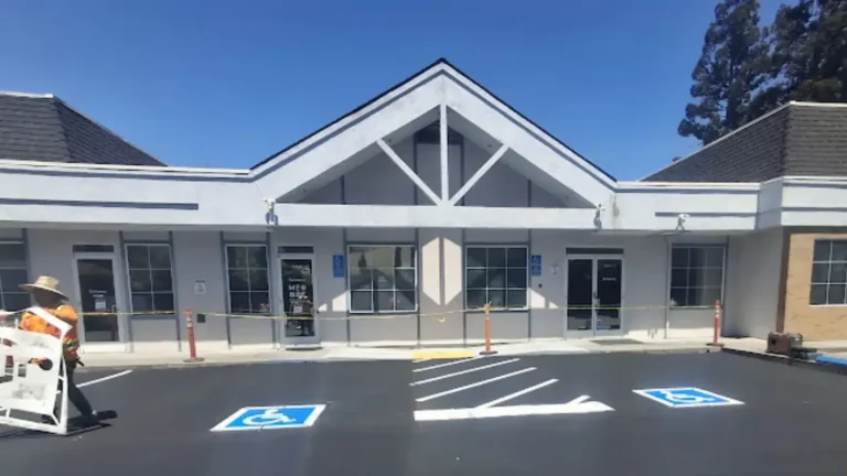 House of Worship Driveway Repair 3 Newly striped parking lot with ADA stalls in front of a one-story building with a gabled roof in California