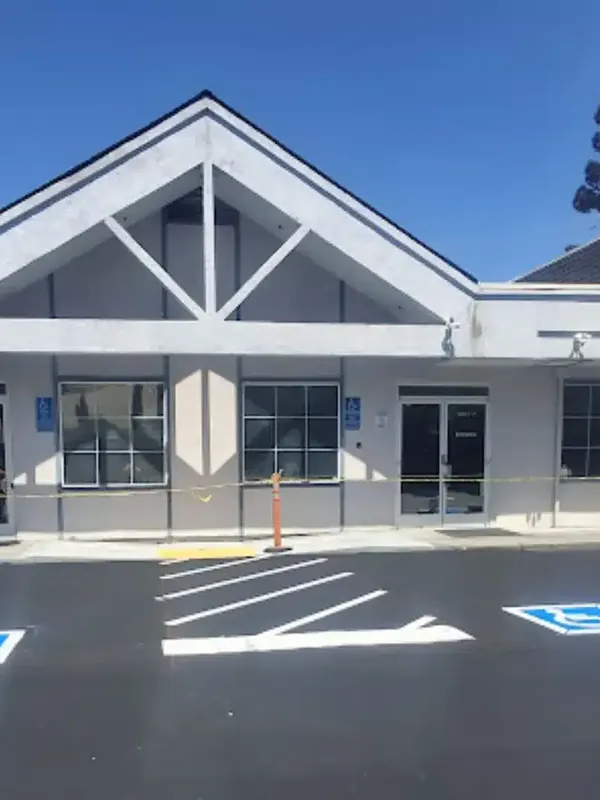 Resource Library 2 Freshly striped parking lot with ADA-accessible stalls in front of a commercial building